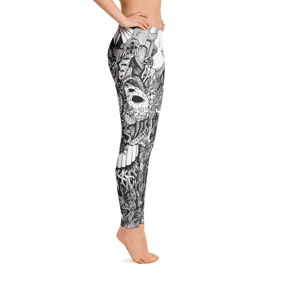 White Leggings with black linework on them of an alien creature. The linework is extensive and contains a lot of detail