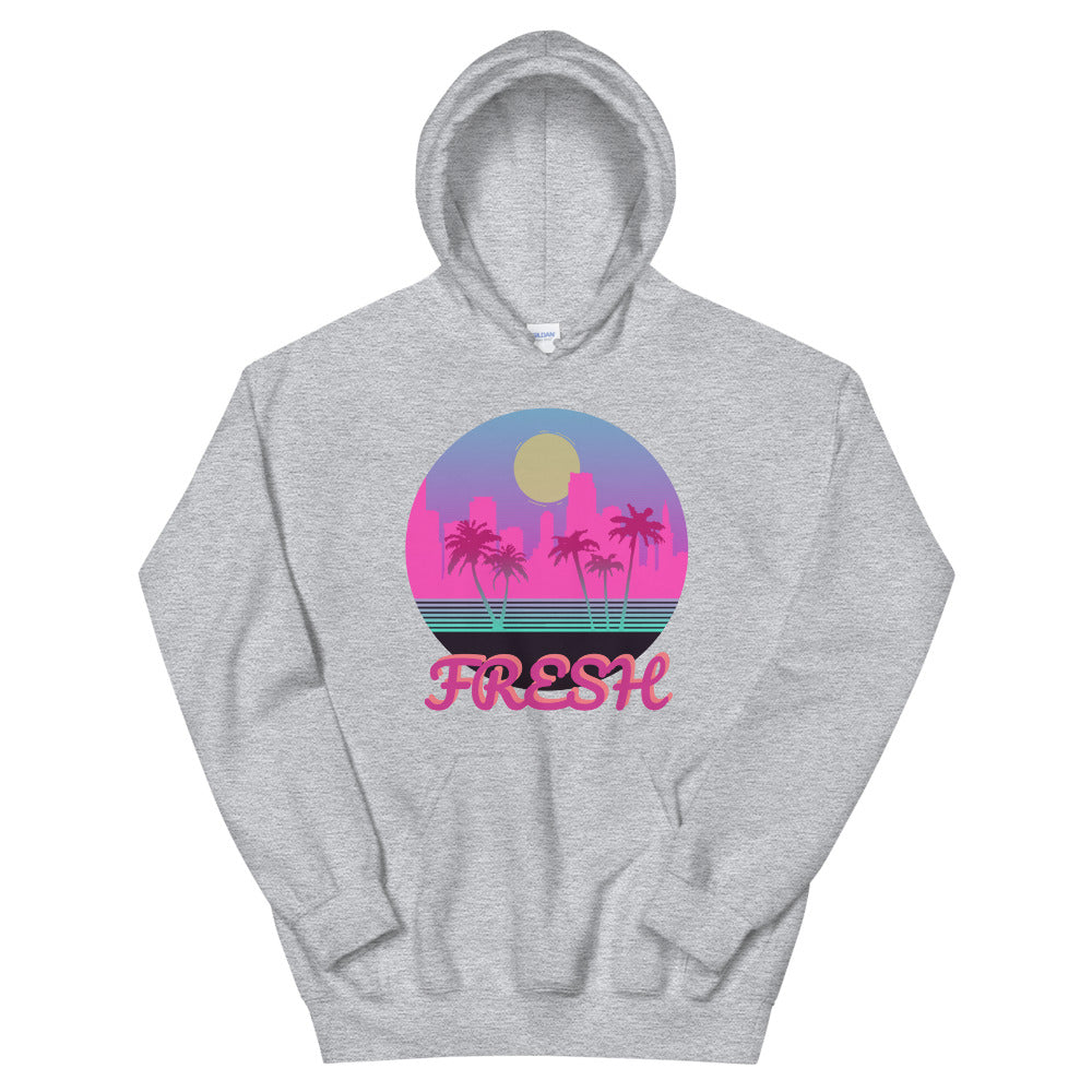 A light gray hoodie with a logo on the front centre. It is a round logo of the Miami skyline. Palm trees frame the image. Fresh is sprawled across the front bottom of the logo